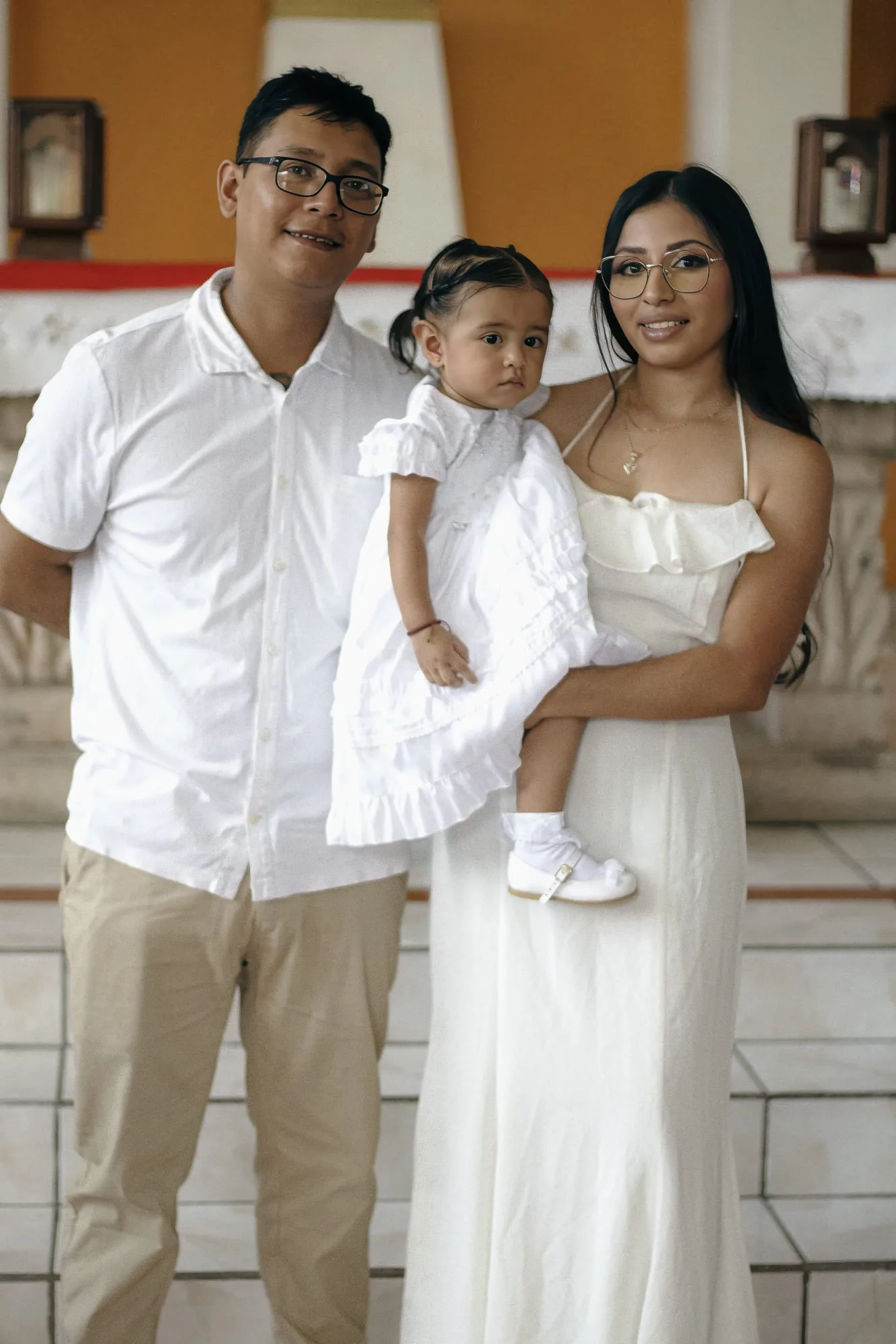 Familia en el bautizo